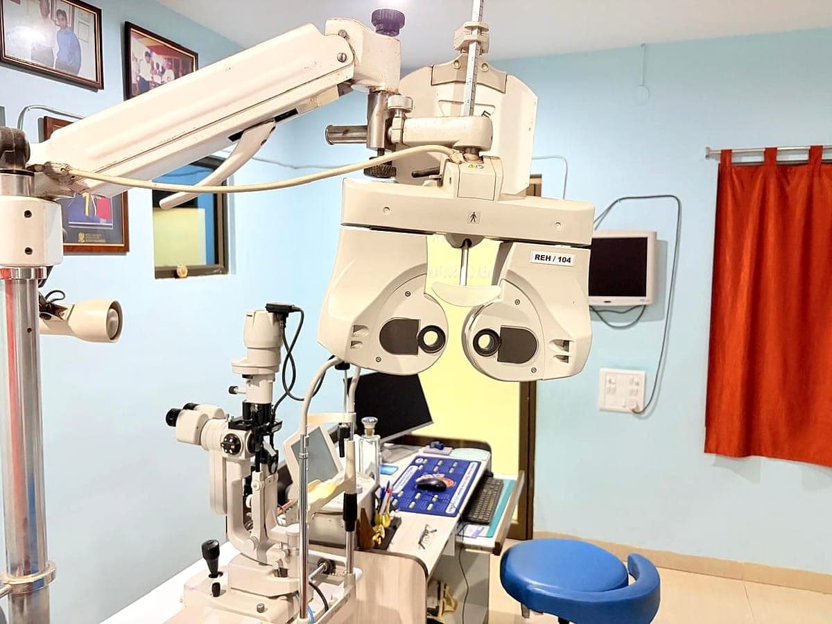 Consultation room with phoropter and slit lamp at Ruby Eye Hospital, Berhampur